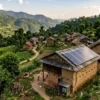 PM-JANMAN solar electrification for tribal households: an off-grid rooftop solar panel installed on a tribal home in rural India