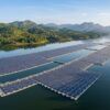 Floating solar panels covering an Indian reservoir under the PM Surya Sarovar Yojana floating solar scheme