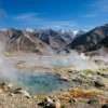 Steaming geothermal hot springs in a high-altitude Ladakh valley, illustrating India geothermal power potential